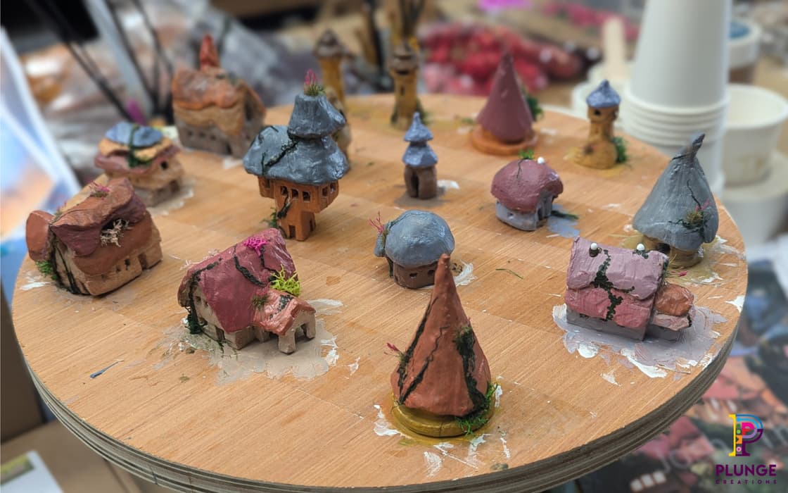Each house in the Munchkin village in the Wicked Land of Oz was hand finished, ready to be placed in the Wicked Christmas tree.