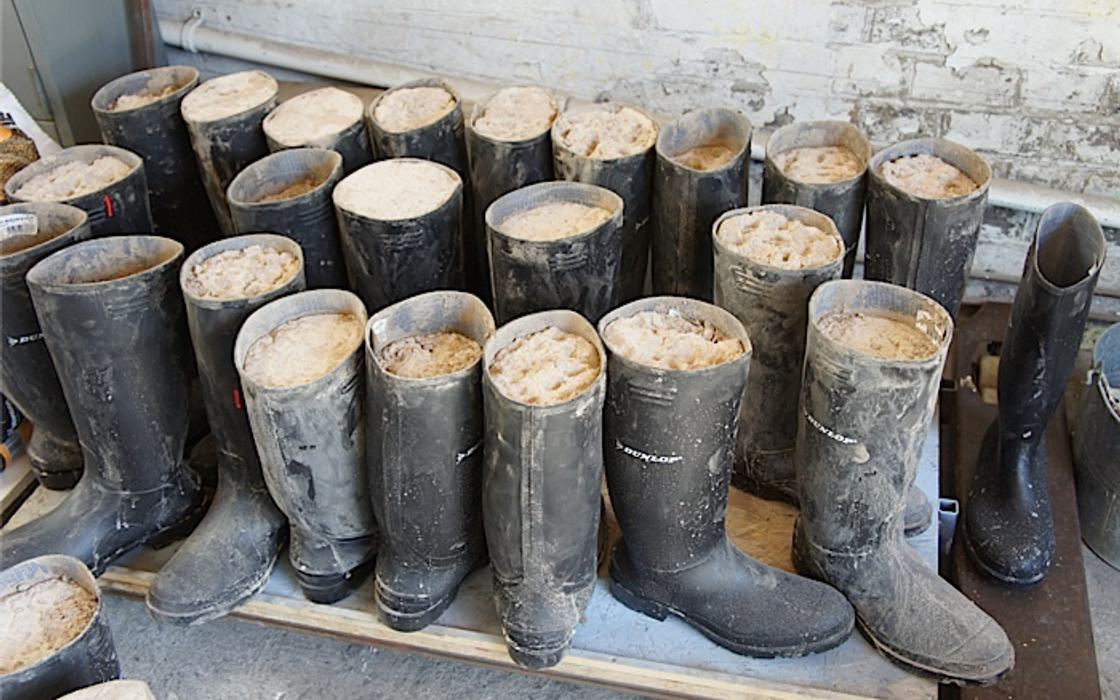 RNLI branded concrete shoes prop  - Wellies concrete