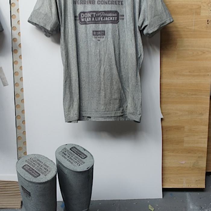 RNLI branded concrete clothing prop - Concrete t-shirt boot prop